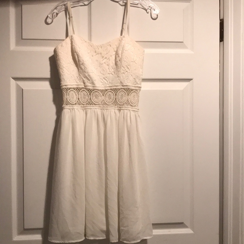 Cream lace dress.
